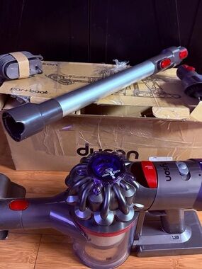 New Dyson v8 Cordless Stick Vacuum Cleaner — Gray/Purple/Red Accents
